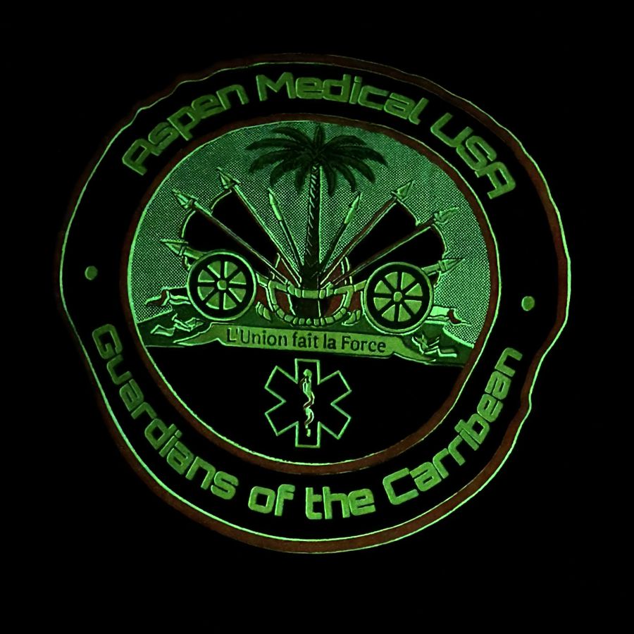Aspen Medical USA crew shirt glowing in the dark